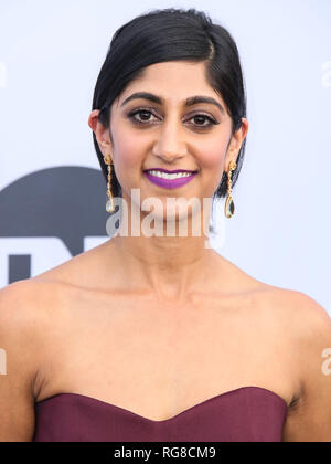 Los Angeles, United States. 27th Jan, 2019. LOS ANGELES, CA, USA - JANUARY 27: Actress Sunita Mani wearing a Badgley Mischka dress, Pollice Lee shoes, a Tyler Ellis handbag, and XIV Karats earrings arrives at the 25th Annual Screen Actors Guild Awards held at The Shrine Auditorium on January 27, 2019 in Los Angeles, California, United States. (Photo by Xavier Collin/Image Press Agency) Credit: Image Press Agency/Alamy Live News Stock Photo