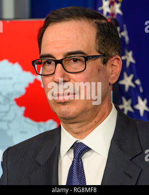 United States Secretary of the Treasury Steven T. Mnunchin conducts a briefing with National Security Advisor John R. Bolton in the Brady Press Briefing Room of the White House in Washington, DC on Monday, January 28, 2019. Bolton and Mnunchin announced that the administration had imposed sanctions on Petroleos De Venezuela S.A., the state-owned oil company of Venezuela, a move aimed to increase the pressure on President Nicolas Maduro to cede power to Juan Guaido. Credit: Ron Sachs/CNP /MediaPunch Stock Photo