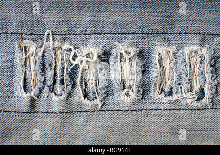 Denim jeans texture or denim jeans background with old torn Stock Photo
