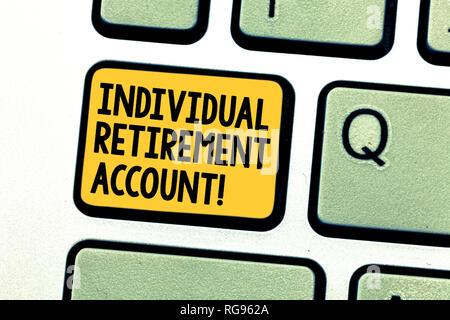 Writing note showing Individual Retirement Account. Business photo showcasing Invest and earmark funds for retirement Keyboard key Intention to create