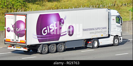 Looking down from above side & back of Gist Dutch hgv lorry truck with articulated trailer & logo Transforming Supply Chain slogan on road England UK Stock Photo