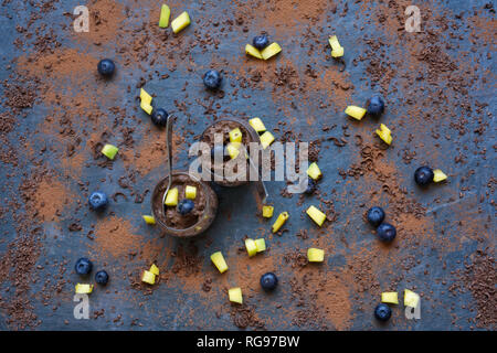 Chocolate Avocado mousse on a slate background. Stock Photo