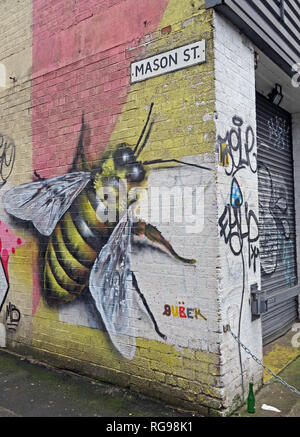 Manchester Bee on wall at Mason St, Northern Quarter, North West England, UK, M4 5JU Stock Photo