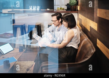 Business Man And Woman Meeting At Work In Office Cafeteria Stock Photo