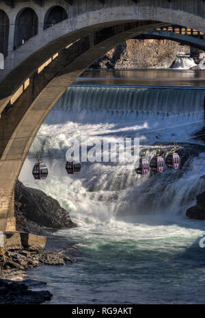 One of the attractions left from the worlds fair in 1974, the gondola skyride over Spokane Falls gives people a unique perspective of the crown Jewel  Stock Photo