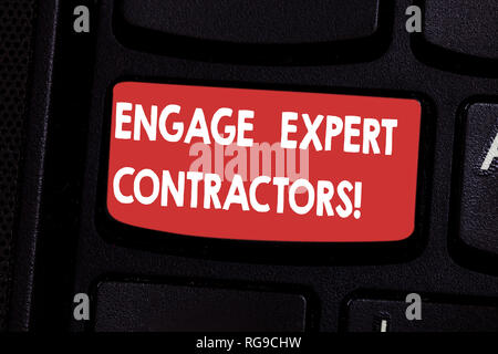 Handwriting text Engage Expert Contractors. Concept meaning Hiring skilled outworkers for a short time work Keyboard key Intention to create computer  Stock Photo