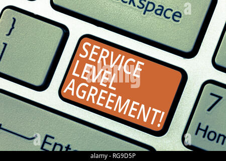 Handwriting text Service Level Agreement. Concept meaning Commitment between a service provider and a client Keyboard key Intention to create computer Stock Photo