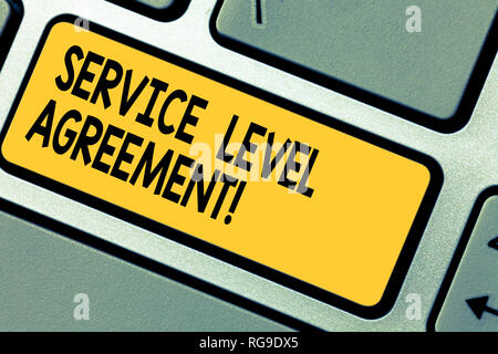 Handwriting text Service Level Agreement. Concept meaning Commitment between a service provider and a client Keyboard key Intention to create computer Stock Photo