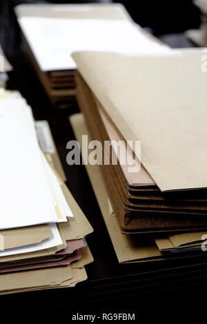 Files and Folders on Desk Work Busy Information working Stock Photo