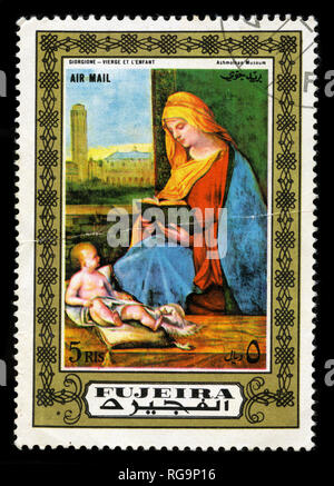 Postage stamp from Fujairah in the Madonna Paintings series issued in 1972 Stock Photo