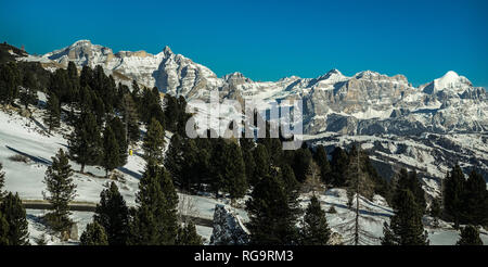 Snowy landscape of val Badia in the Dolomites, South Tyrol, Italy seen from Gardena pass Stock Photo