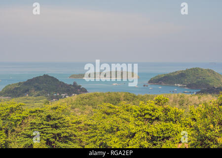 Tropical beach landscape panorama. Beautiful turquoise ocean waives with boats and sandy coastline from high view point. Kata and Karon beaches, Phuke Stock Photo