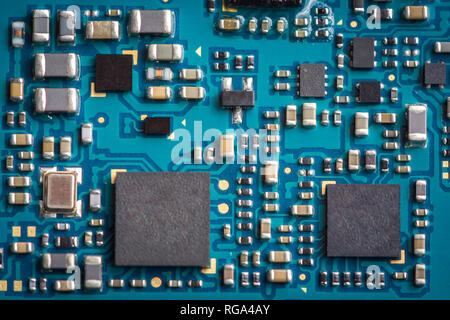 Close up zoom shot of mobile phone mother board with microchips and circuits Stock Photo