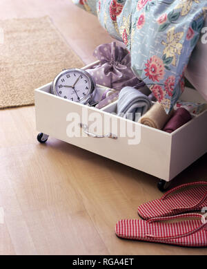Pull Out Under Bed Storage Drawer On Casters Stock Photo