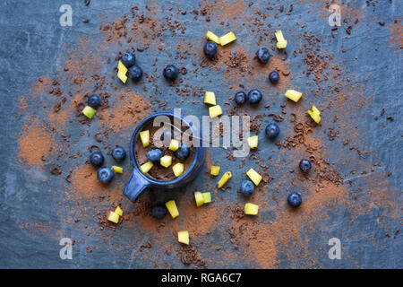 Chocolate Avocado mousse on a slate background. Stock Photo
