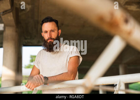 Portrait of bearded young man outdoors Stock Photo
