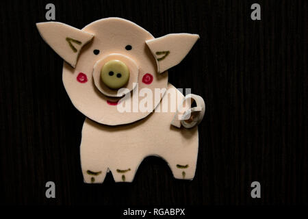 Crafts, figurine: a pig Symbol of 2019 new year Stock Photo