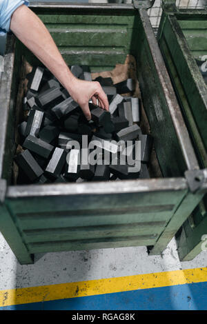 Man in company checking qualita of new material Stock Photo