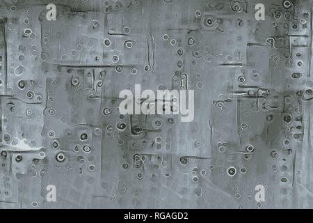 Texture of an airplane with rivets and screws and metal plates Stock Photo