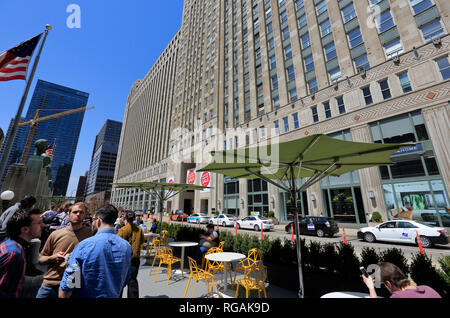 Office workers taking lunch break outside of Merchandise Mart. Chicago.Illinois.USA Stock Photo
