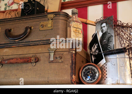 Old suitcases and a photo of Ernest Hemingway display in his birthplace at 339 N. Oak Park Avenue.Oak Park. West of Chicago. Illinois. USA Stock Photo