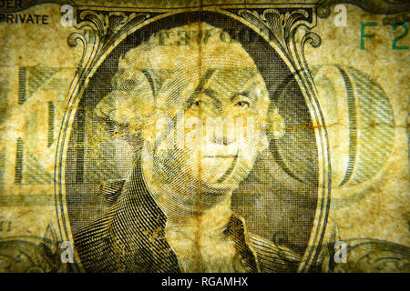 Dolar USA close-up. Old battered crumpled bills macro. The texture of the fragment of the dollar bill. USD banknote texture. Stock Photo