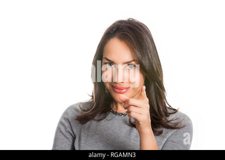 Closeup portrait of a beautiful young woman thinking or having an idea isolated on white background Stock Photo