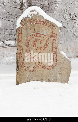The Gripsholm rune stone is a runestone with runic inscriptions from the 11 th century and it is located in Mariefred near the Gripsholm castle in the Stock Photo