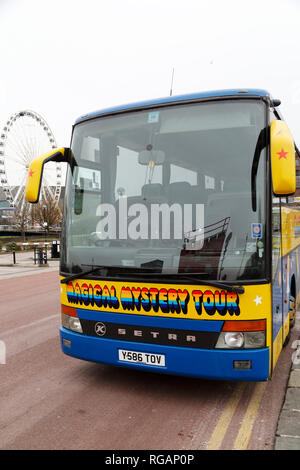 The Magical Mystery Tour bus in Liverpool, England. The bus tour takes participants to locations associated with The Beatles in Liverpool. Stock Photo