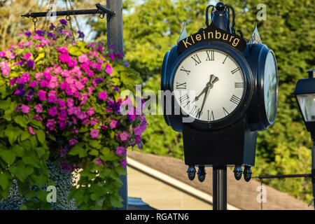 Antique vintage outdoor clock in the village of Kleinberg Ontario. Stock Photo