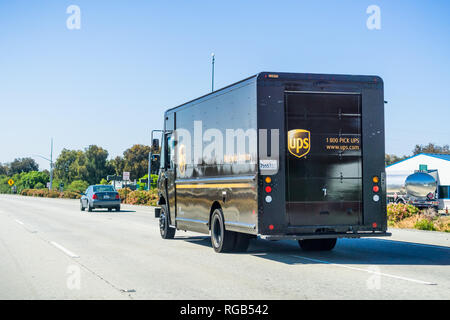 June 8, 2018 Morgan Hill / CA / USA - UPS delivery truck driving on the highway in south San Francisco bay Stock Photo