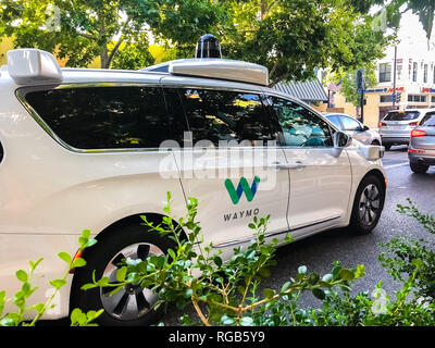 July 20, 2018 Mountain View / CA / USA - Waymo self driving car cruising on a busy street in south San Francisco bay area, Silicon Valley Stock Photo