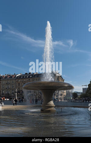 old opera, alte oper in frankfurt am main with opera fountain and walkers, germany Stock Photo