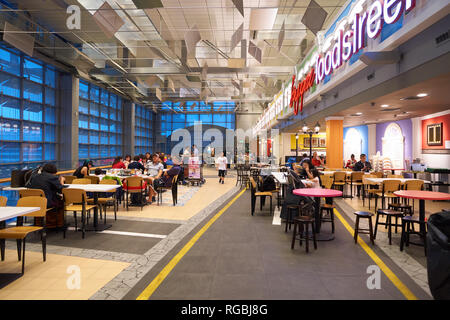 SINGAPORE - CIRCA AUGUST, 2016: inside Singapore Changi Airport. Changi Airport is one of the largest transportation hubs in Southeast Asia. Stock Photo