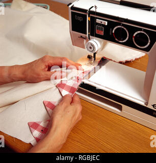 Using A Sewing Machine To Hem A Curtain Stock Photo 233806864 Alamy