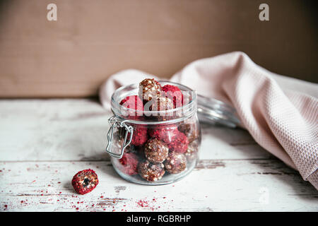 Energy balls in preserving jar, date, raisin and cashew Stock Photo