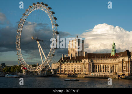The iconic London Eye ferris wheel on the South Bank, London, in early evening light. Stock Photo