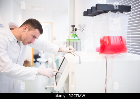 Scientist working in lab Stock Photo