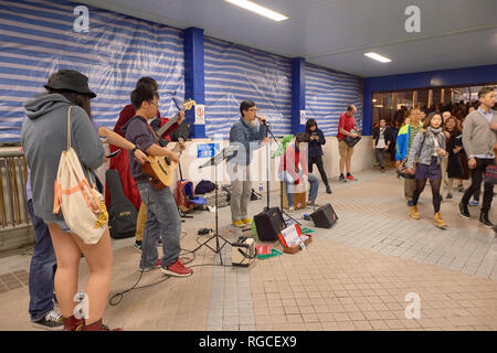 HONG KONG - CIRCA DECEMBER, 2015: musicians in Hong Kong. Stock Photo