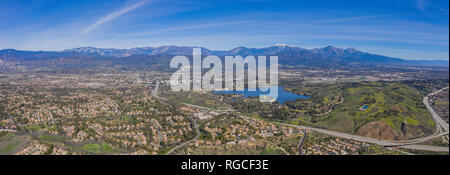 Aerial view of Puddingstone Reservoir with Mt. Baldy as background at California Stock Photo