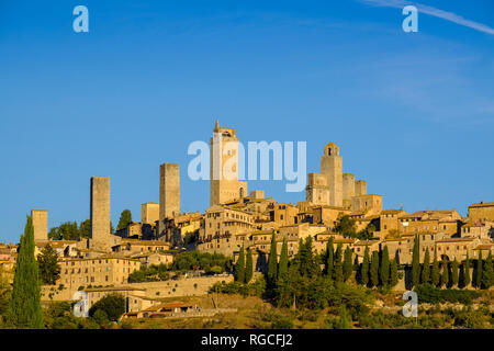 Italy, Tuscany, San Gimignano, cityview with gender towers in the morning light