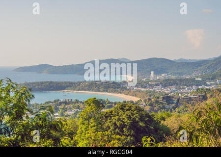 Tropical beach landscape panorama. Beautiful turquoise ocean waives with boats and sandy coastline from high view point. Kata and Karon beaches Stock Photo
