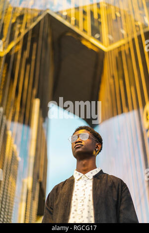 Portrait of a young black man, wearing a glasses Stock Photo