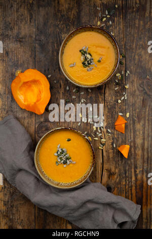 Pumpkin soup with pumpkin and sunflower seeds Stock Photo
