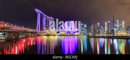 Marina Bay view with Marina Bay Sands Hotel and skyline of Singapore town by night Stock Photo