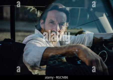 Man driving convertible in Munich, Bavaria, Germany Stock Photo