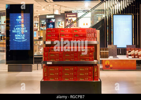 can i bring cigarettes in singapore airport SINGAPORE - CIRCA SEPTEMBER, 2016: cigarettes on display at a store in Singapore  Changi Airport. Changi Airport is one of the largest transportation h Stock  Photo