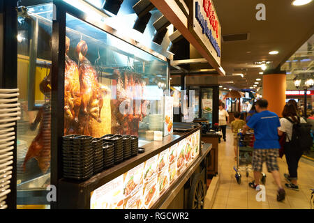 SINGAPORE - CIRCA AUGUST, 2016: roasted duck on display in a restaurant at Singapore Changi Airport. Changi Airport is one of the largest transportati Stock Photo