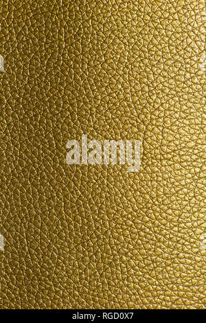 Shiny golden colour leather bright background. Geometric shapes. Brillante superficie backdrop. Abstract compositions. Stock Photo