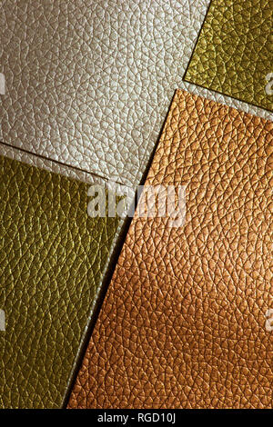 Shiny golden colour leather bright background. Geometric shapes. Brillante superficie backdrop. Abstract compositions. Stock Photo